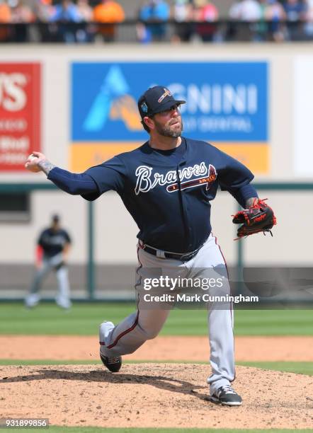 Peter Moylan of the Atlanta Braves pitches during the Spring Training game against the Detroit Tigers at Publix Field at Joker Marchant Stadium on...