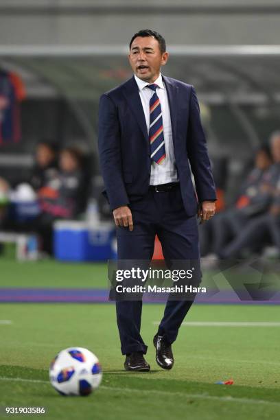 Kenta Hasegawa,coach of FC Tokyo looks on during the J.League YBC Levain Cup Group A match between FC Tokyo and Albirex Niigata at Ajinomoto Stadium...