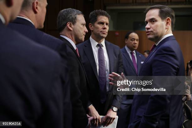 Sen. Marco Rubio talks with Acting Deputy Director of the Federal Bureau of Investigation David Bowdich and other officials before a Senate Judiciary...