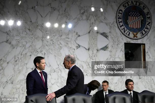 Sen. Marco Rubio talks with Senate Judiciary Committee Chairman Charles Grassley before a hearing about the massacre at Marjory Stoneman Douglas High...