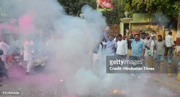 Lucknow, INDIA Samajwadi Party workers celebrating their party's victory in Gorakhpur and Phulpur Lok Sabha by-election, on March 14, 2018 in...