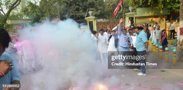 Lucknow, INDIA Samajwadi Party workers celebrating their party's victory in Gorakhpur and Phulpur Lok Sabha by-election, on March 14, 2018 in...