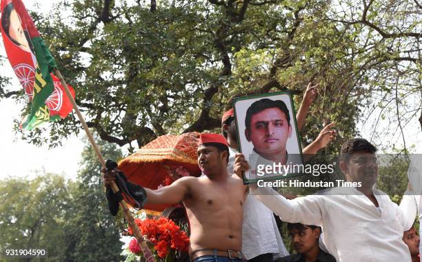 Lucknow, INDIA Samajwadi Party workers celebrating their party's victory in Gorakhpur and Phulpur Lok Sabha by-election, on March 14, 2018 in...
