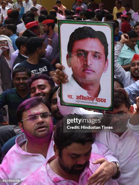 Lucknow, INDIA Samajwadi Party workers celebrating their party's victory in Gorakhpur and Phulpur Lok Sabha by-election, on March 14, 2018 in...