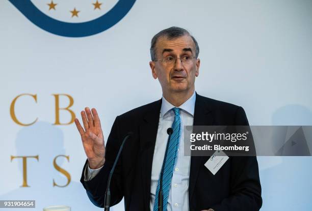 Francois Villeroy de Galhau, governor of the Bank of France, gestures while speaking at the 'ECB and its Watchers' conference in Frankfurt, Germany,...