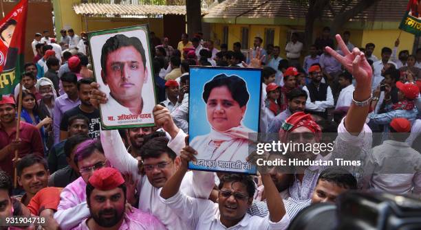 Samajwadi Party workers celebrating their party's victory in Gorakhpur and Phulpur Lok Sabha by-poll at party headquarters, on March 14, 2018 in...