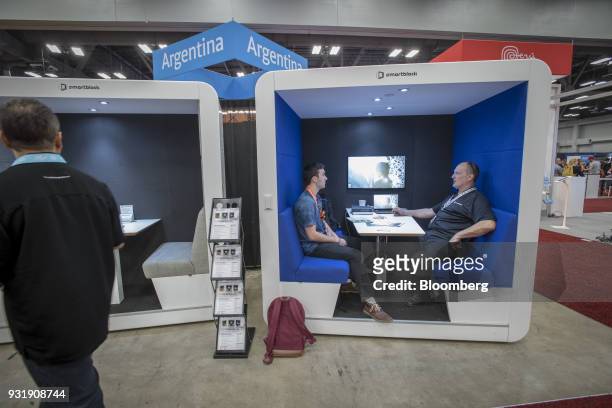 Attendees sit in a Smartblock moveable and modular meeting pod at the South By Southwest conference in Austin, Texas, U.S., on Tuesday, March 13,...