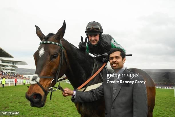 Cheltenham , United Kingdom - 14 March 2018; Jockey Nico de Boinville, celebrates winning The Betway Queen Mother Champion Steeple Chase on Altior on...