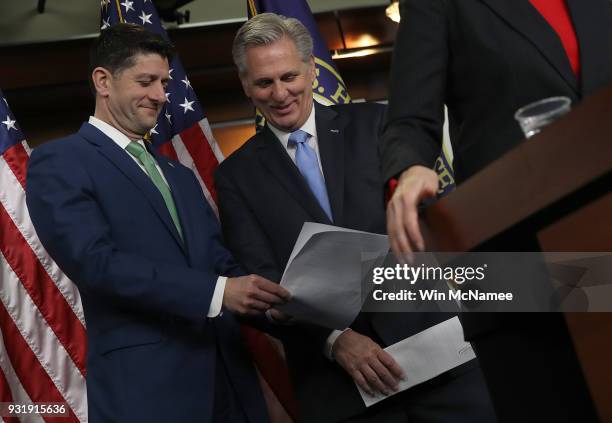 Speaker of the House Paul Ryan confers with Rep. Kevin McCarthy during a press conference at the U.S. Capitol on March 14, 2018 in Washington, DC....