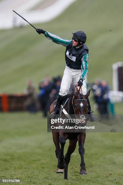 Nico de Boinville riding Altior clear the last to win The Betway Queen Mother Champion Steeple Chase at Cheltenham racecourse on Ladies Day on March...