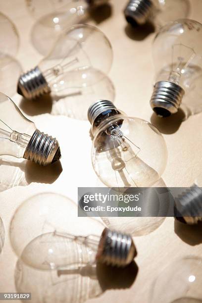 a medium group of light bulbs - medium group of objects fotografías e imágenes de stock