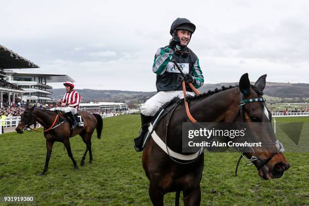 Nico de Boinville riding Altior win The Betway Queen Mother Champion Steeple Chase at Cheltenham racecourse on Ladies Day on March 14, 2018 in...