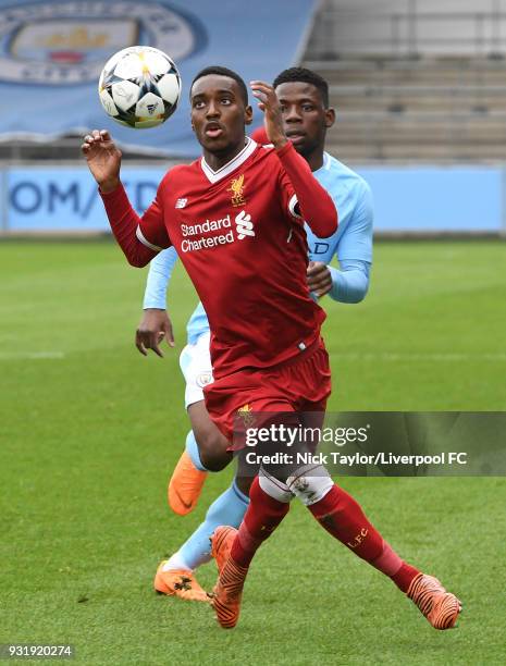 Rafael Camacho of Liverpool and Tom Dele-Bashiru of Manchester City in action during the Manchester City v Liverpool UEFA Youth League game at...