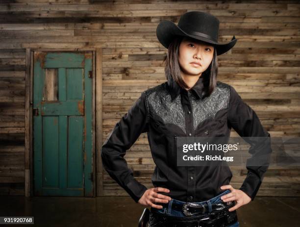 asian cowgirl - retro cowgirl stock pictures, royalty-free photos & images