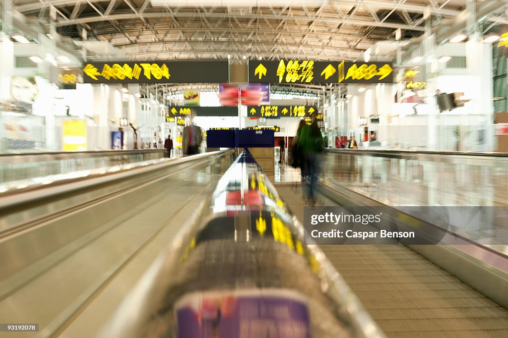 A moving walkway in an airport