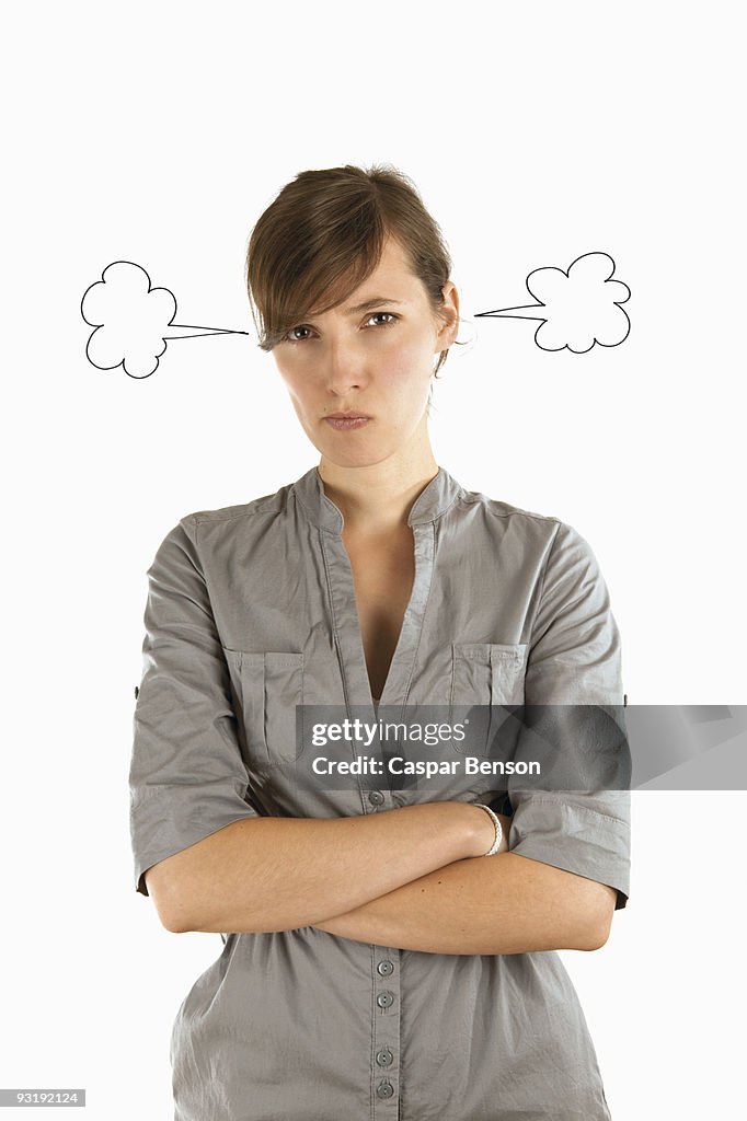 A young woman with drawings of steam coming out of her ears