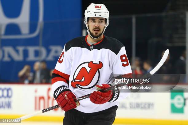 Marcus Johansson of the New Jersey Devils skates against the New York Islanders at Barclays Center on January 16, 2018 in New York City. New Jersey...