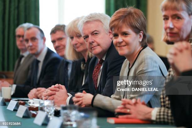 First Minister of Wales, Carwyn Jones and Scotland's First Minister Nicola Sturgeon attend a meeting of the Joint Ministerial Committee, chaired by...