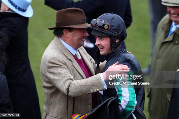 Nicky Henderson and Nico de Boinville celebrate after winning the Betway Queen Mother Champion Chase with Altior during Cheltenham Festival Ladies...