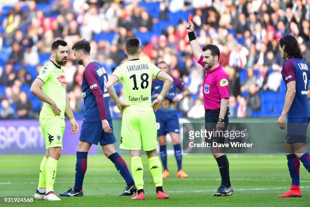 Thiago Motta of PSG receives a red card after his studs land on the chest of Romain Thomas of Angers during the Ligue 1 match between Paris Saint...