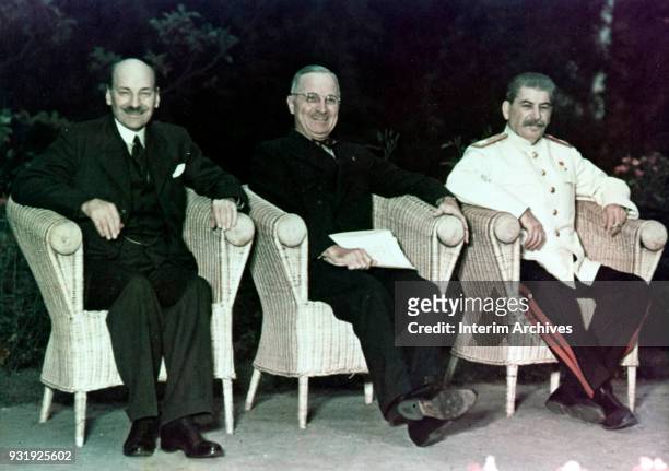 Portrait of, from left, British Prime Minister Clement Attlee , American President Harry S Truman , and Soviet Premier Joseph Stalin as they sit...