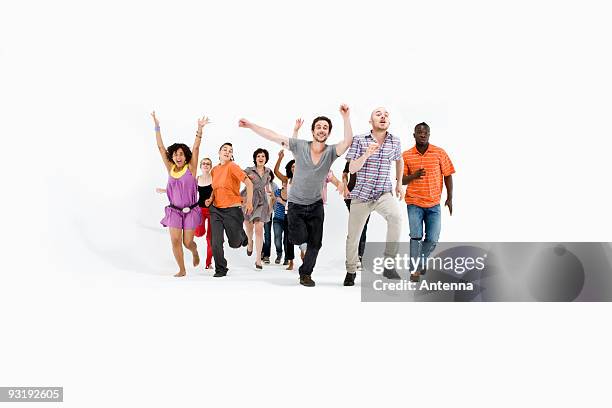 group of men and women running - runstudio stock pictures, royalty-free photos & images