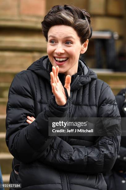 Caitriona Balfe from the TV series Outlander meets fans who were waiting in St Andrew's Square on March 14, 2018 in Glasgow,Scotland. Dozens of fans...