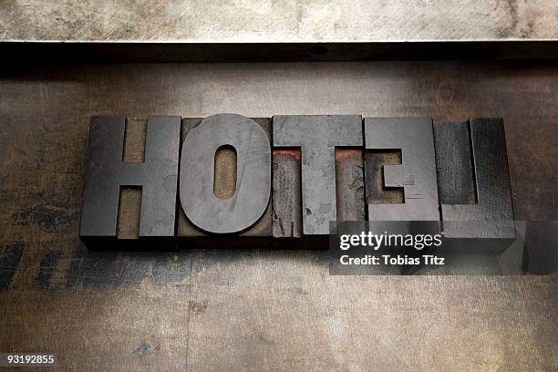 the word hotel written with wood letterpress letters - printing block stock pictures, royalty-free photos & images