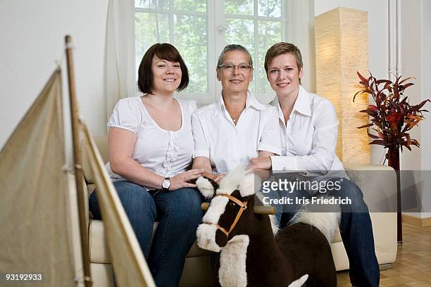 formal portrait of a mother and her two daughters - formal shirt stock pictures, royalty-free photos & images