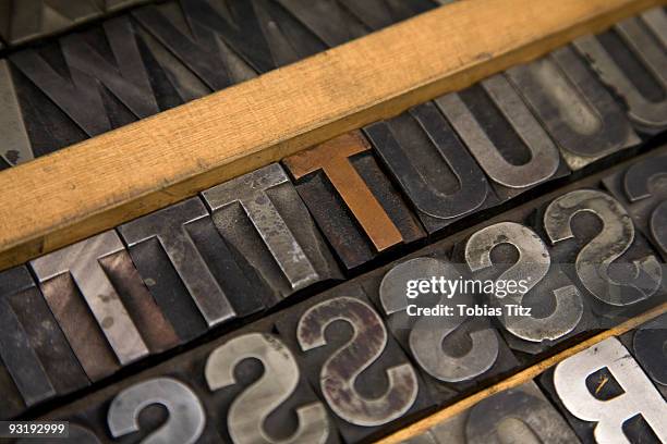group of metal letterpress letters - printing block stock pictures, royalty-free photos & images