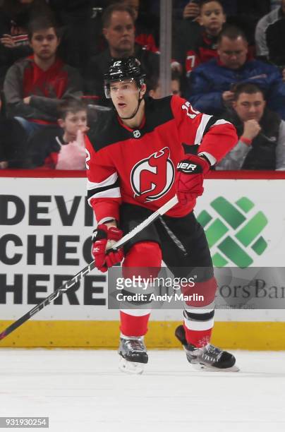 Ben Lovejoy of the New Jersey Devils skates during the game against the Winnipeg Jets at Prudential Center on March 8, 2018 in Newark, New Jersey.