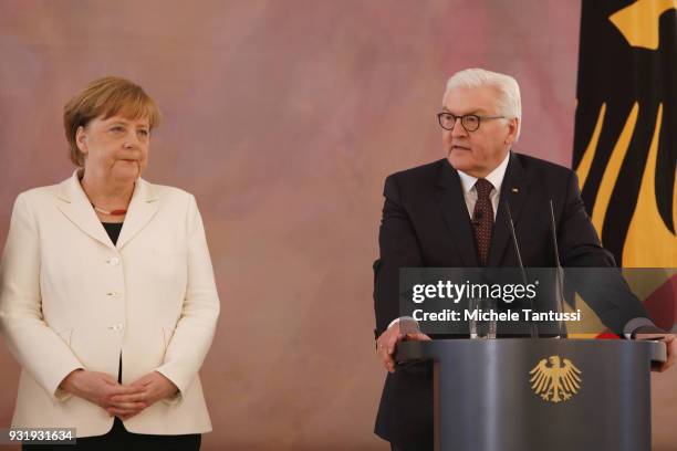 Education and Germany Chancellor Angela Merkel listens to Germany President Frank-Walter Steinmeier as she takes her oath to serve as Chancellor...