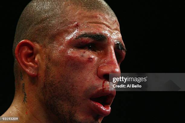 Miguel Cotto of Puerto Rico looks on from the ring before losing to Manny Pacquiao by 12th round TKO during their WBO welterweight title fight at the...