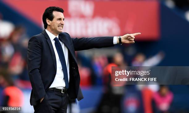 Paris Saint-Germain's Spanish headcoach Unai Emery gestures as he shouts instructions to his players from the touchline during the French Ligue 1...