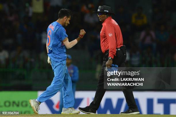 Indian cricketer Yuzvendra Chahal celebrates after he dismissed Bangladesh cricket captain Mahmudullah during the Fifth Match, Nidahas Twenty20...