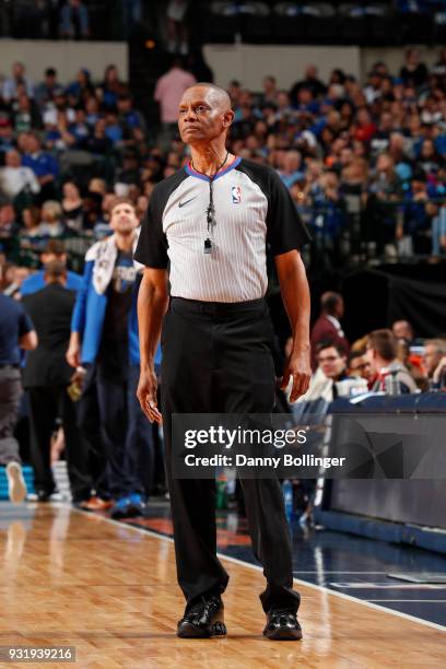 Referee, Michael Smith makes a call during the Memphis Grizzlies game against the Dallas Mavericks on March 10, 2018 at the American Airlines Center...