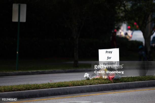 Pray for Parkland" sign is displayed on a median during the ENOUGH: National School Walkout rally at Marjory Stoneman Douglas High School in...