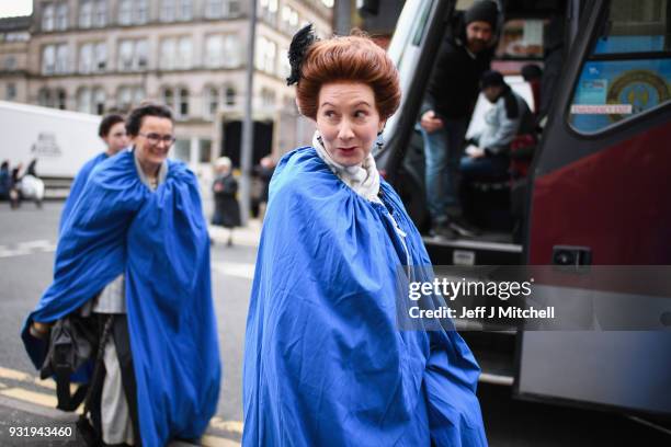 Members of the cast from the TV series Outlander depart a filming location at St Andrew's Square on March 14, 2018 in Glasgow,Scotland. Dozens of...