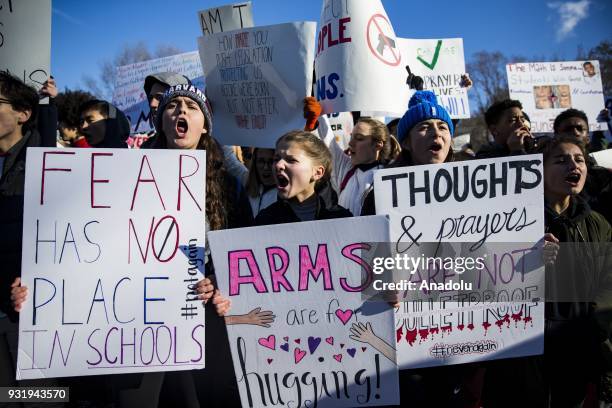 Thousands of students protest in front of the White House for greater gun control after walking out of classes in the aftermath of the shooting after...