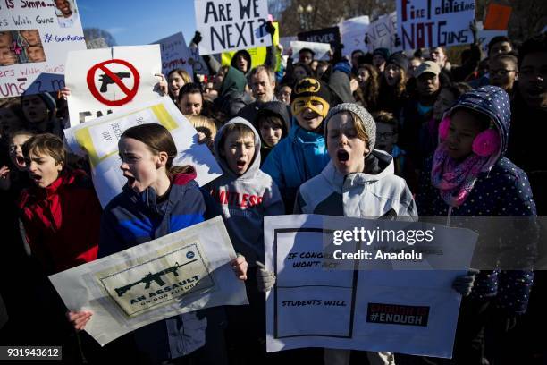 Thousands of students protest in front of the White House for greater gun control after walking out of classes in the aftermath of the shooting after...
