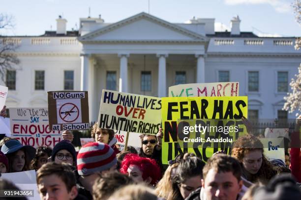 Thousands of students protest in front of the White House for greater gun control after walking out of classes in the aftermath of the shooting after...