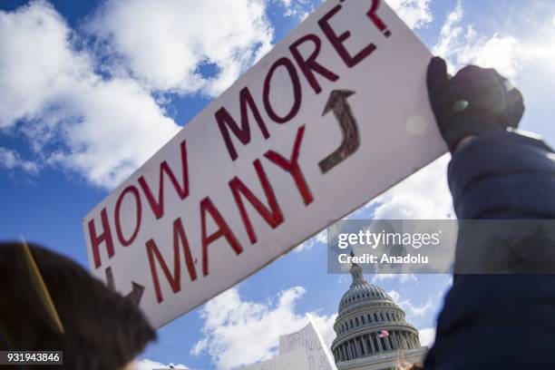 Thousands of students protest in front of the U.S. Capitol for greater gun control after walking out of classes in the aftermath of the shooting...