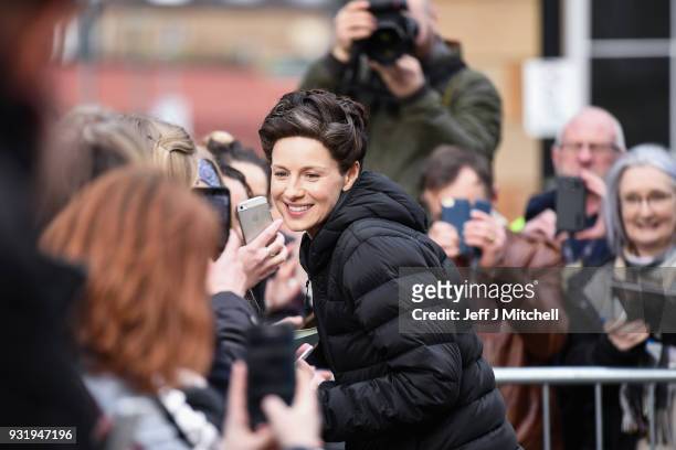 Caitriona Balfe from the TV series Outlander meets fans who were waiting in St Andrew's Square on March 14, 2018 in Glasgow,Scotland. Dozens of fans...
