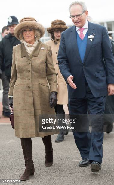 Camilla, Duchess of Cornwall Honorary Member of the Jockey Club walks with with Robert Waley-Cohen as she attends the second day of The Festival,...