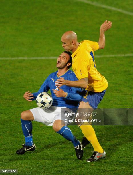 Giampaolo Pazzini of Italy and Daniel Majstorovic of Sweden vie for the ball during the international friendly match between Italy and Sweden at Dino...