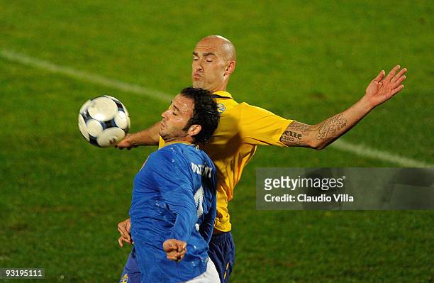 Giampaolo Pazzini of Italy and Daniel Majstorovic of Sweden vie for the ball during the international friendly match between Italy and Sweden at Dino...
