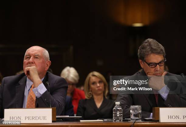 Agriculture Secretary Sonny Perdue, , and Energy Secretary Rick Perry, appear before the Senate Commerce, Science and Transportation Committee, on...