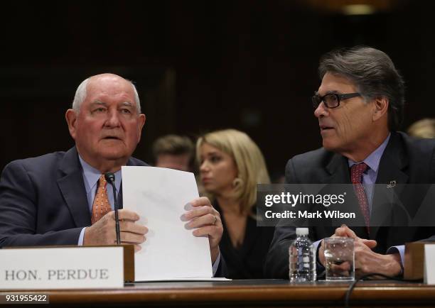 Agriculture Secretary Sonny Perdue, , and Energy Secretary Rick Perry, appear before the Senate Commerce, Science and Transportation Committee, on...