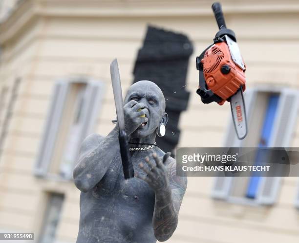 The worlds most tattooed man, Gregory Paul Mclaren, performs as Lucky Diamond Rich during a photo session on March 14 in Vienna, Austria. / Austria...