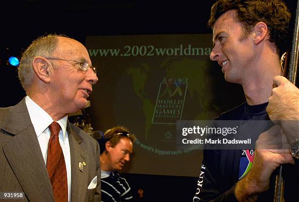 John Landy talks to Nick Green , during the launch of the 2002 World Masters Games, held at Melbourne Park, in Melbourne, Australia. Mandatory...